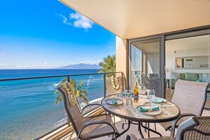 Outdoor dining - Mahana 718 Direct Oceanfront Condo with Panoramic Pacific Views (Lahaina)