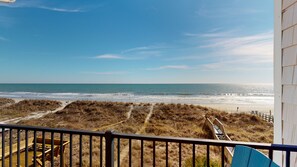 A balcony with a view of the beach and ocean. - Margarita Villas A (North Myrtle Beach)
