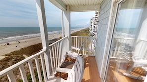 A balcony with a view of the beach and ocean. - Ambassador Villas 403 (North Myrtle Beach)