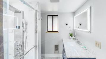 Shower, hair dryer, towels