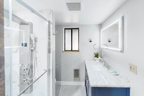 Shower, hair dryer, towels