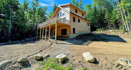 73R 73R Brand new log Home on Quiet Side