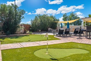 Outdoor dining - Modern 4BR Oasis with Pool, Huge Yard&Putting Green (Scottsdale)