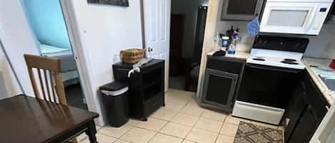 Fridge, microwave, stovetop, cookware/dishes/utensils