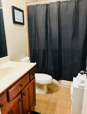 Jetted bath, hair dryer, towels, soap