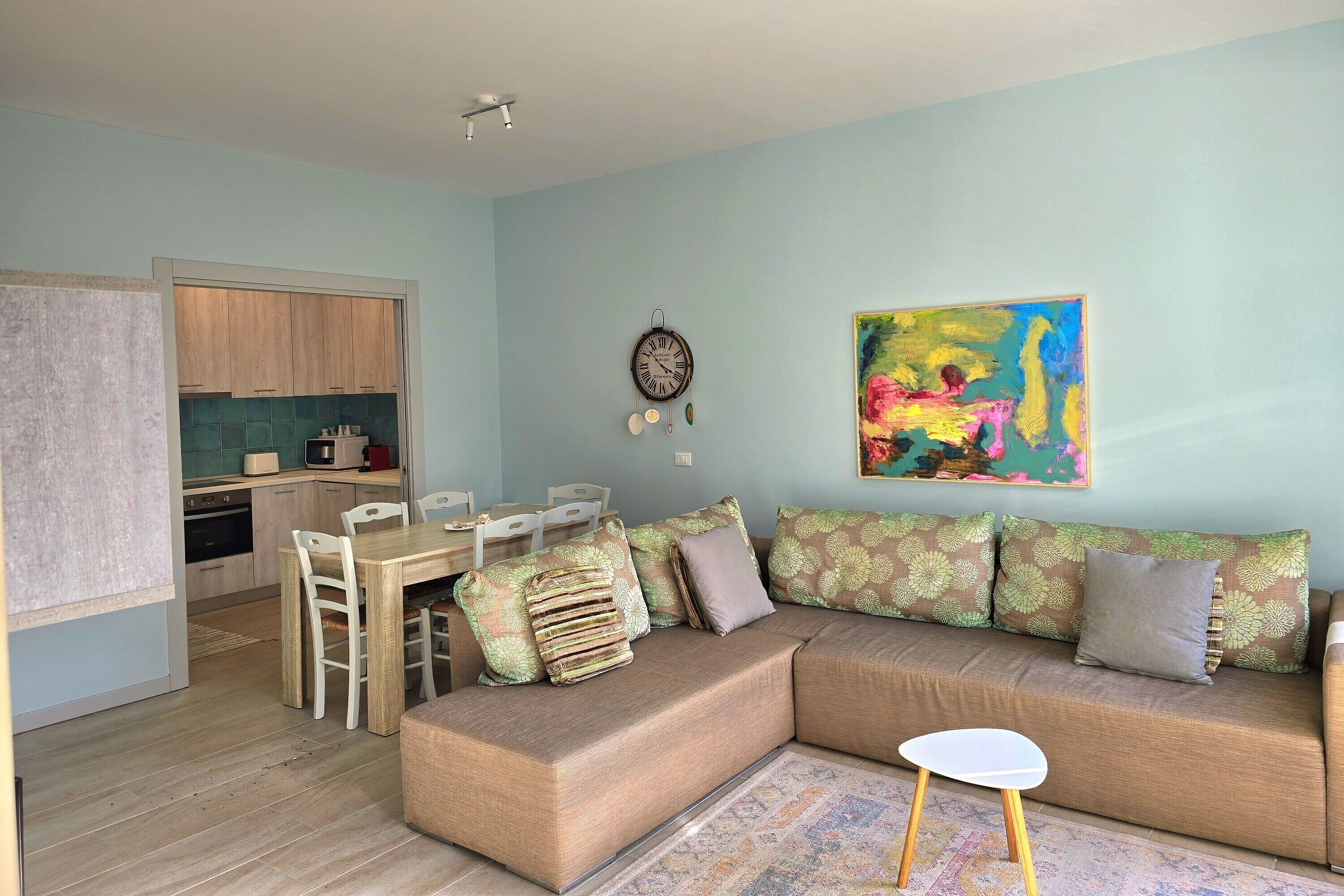 Family Apartment, Multiple Bedrooms, 2 Bathrooms (Lura 2 Holiday Homes 127) | Living area | 21-inch TV with cable channels