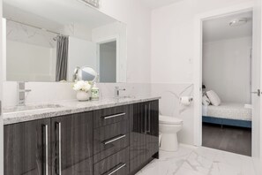 Hair dryer, towels, soap, toilet paper