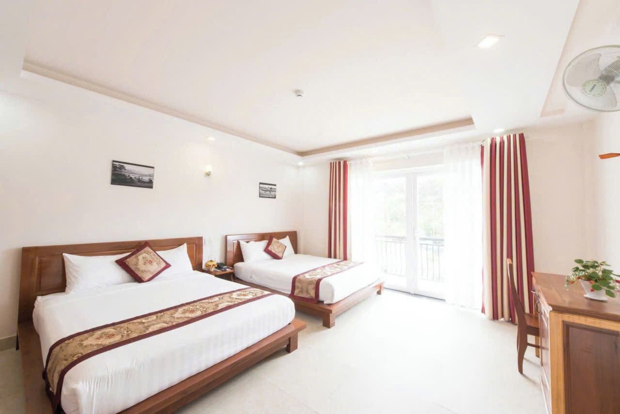 Deluxe Quadruple Room | Desk, free WiFi
