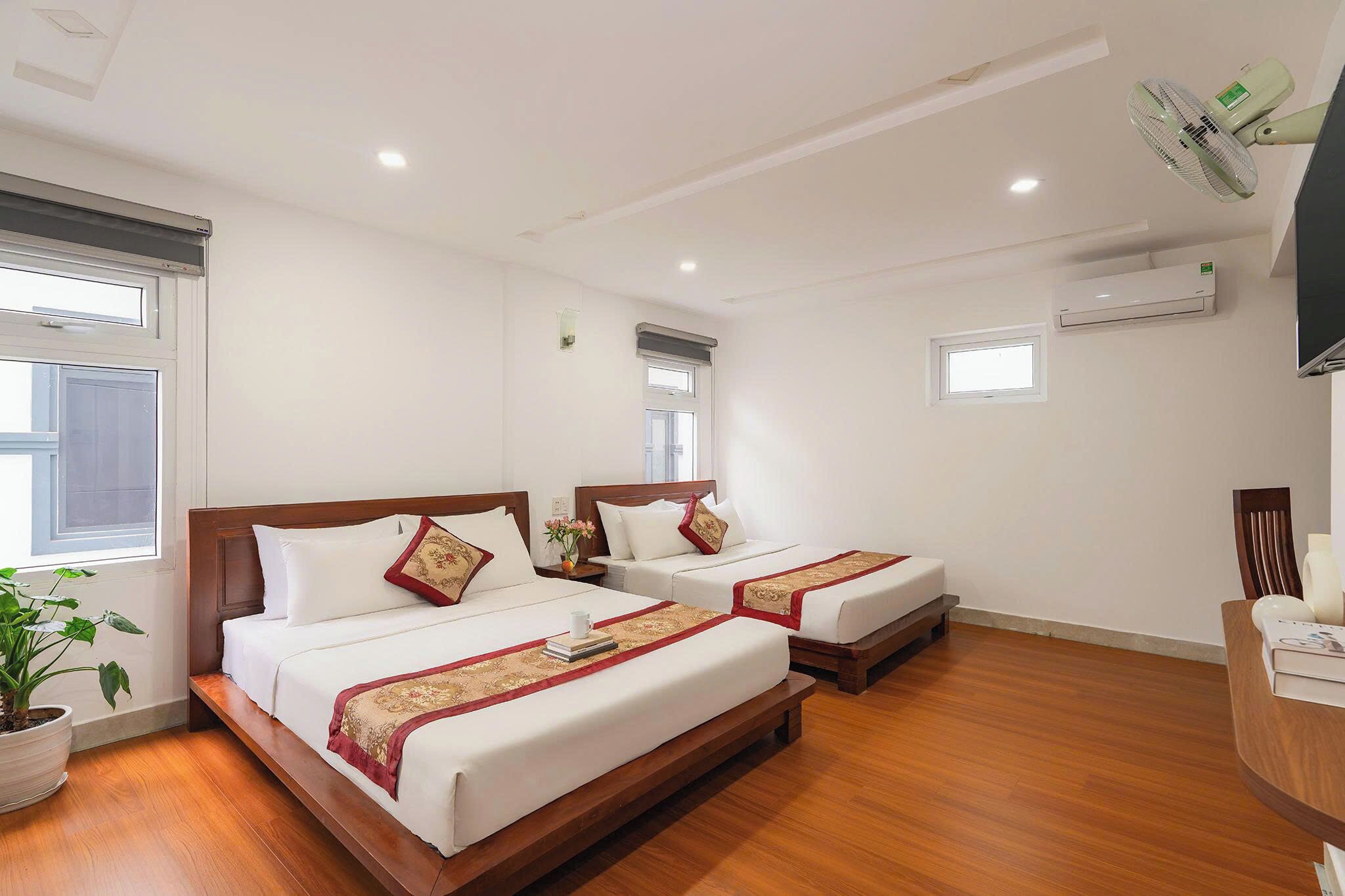 Doppia Standard, 2 letti queen, aria condizionata | Una scrivania, Wi-Fi gratuito