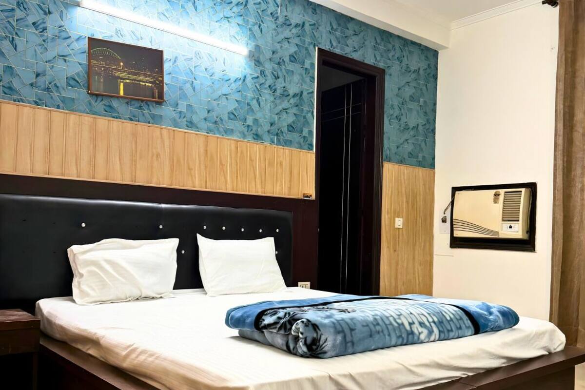Deluxe Double Room, Balcony, Garden View | Free WiFi