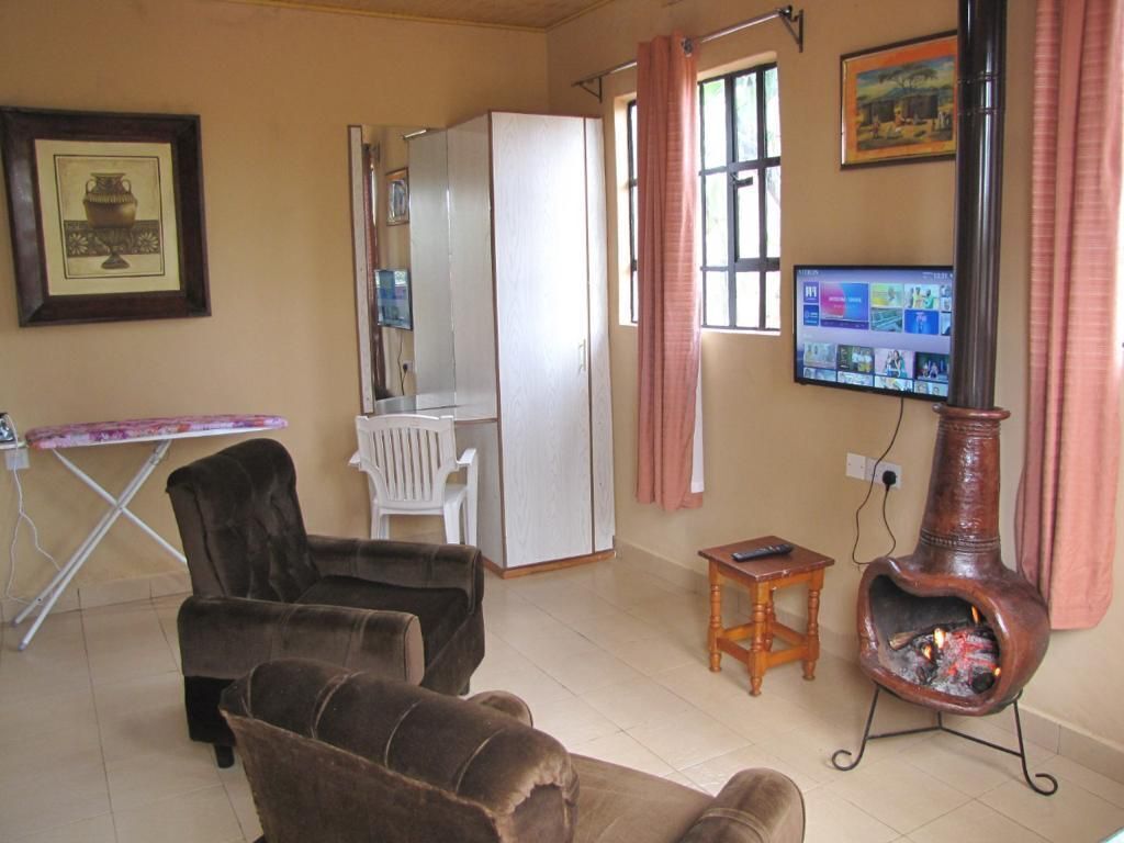 Appartement Affaires | Coin séjour | TV connectée de 32 pouces avec chaînes numériques