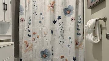 Hair dryer, towels, soap, shampoo