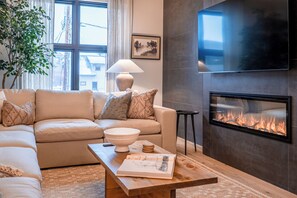Smart TV, fireplace, table football, books - Luxe Downtown Penthouse • Panoramic Hot Tub Views (Whitefish)