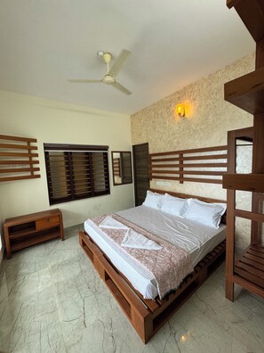 Basic Room - Grovestay (Kannur)
