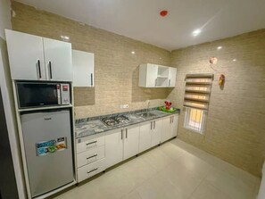 Family Apartment, City View | Private kitchen - B12  Apartment (Lagos)