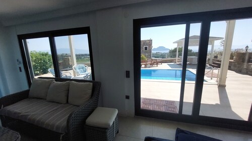 Panoramic view - modern apartment with large private pool area, beach 1km