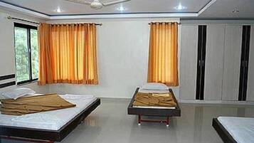 Desk, laptop workspace, blackout curtains, iron/ironing board