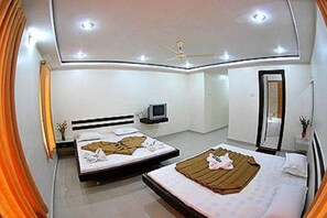 Family Room, City View | Desk, laptop workspace, blackout drapes, soundproofing