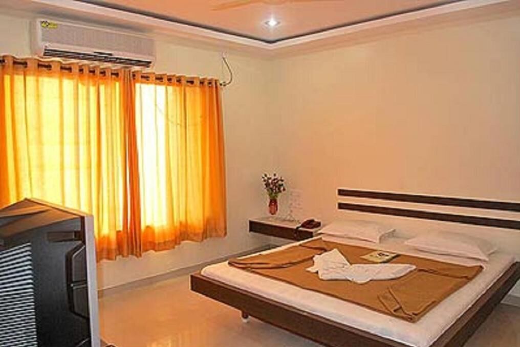 Desk, laptop workspace, blackout curtains, iron/ironing board