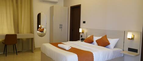 Deluxe Single Room, City View | Desk, laptop workspace, free WiFi