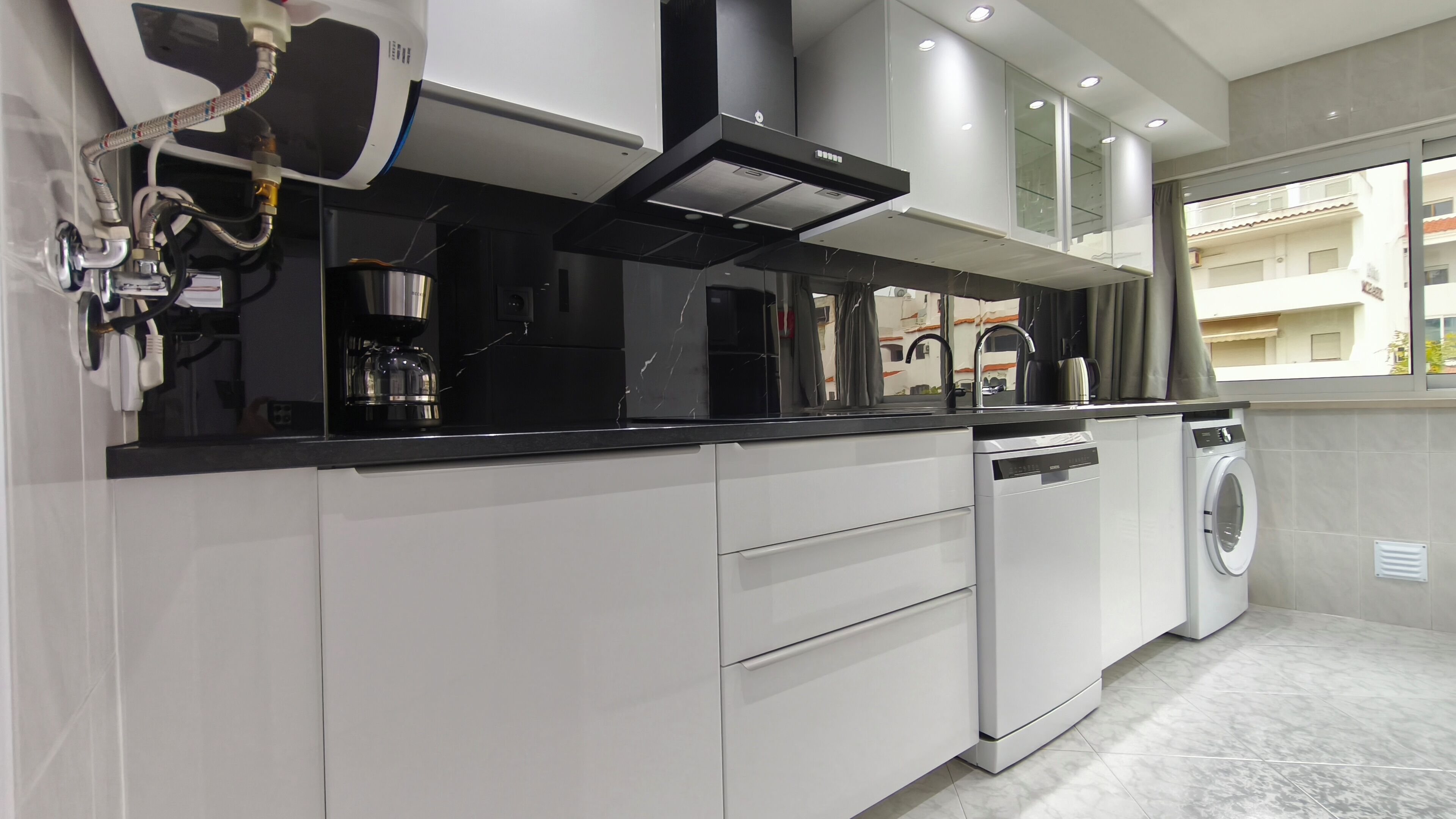 Coffee/tea maker, fridge, microwave, oven