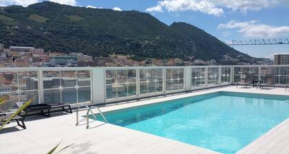 NEW with AC Central Suites with Pool and Squash Courts! Sleeps Family or 4