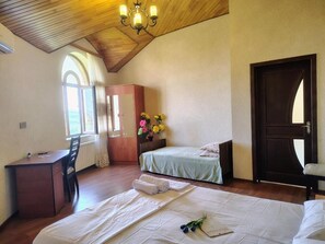 Family Triple Room | Iron/ironing board, free WiFi - NarInn Guesthouse (İsmayıllı)