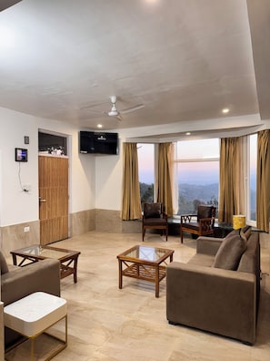Living area - Lans Bliss Villa 3BHK with Sunset View by Homeyhuts (Lansdowne)