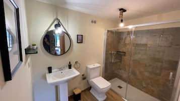 Hair dryer, towels, soap, toilet paper