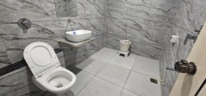 Deluxe Double Room, City View | Bathroom | Shower, slippers, towels, soap - HOTEL ROYAL VIEW (Sabarmati)