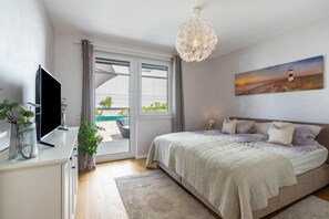 2 dormitorios, tabla de planchar con plancha, wifi y ropa de cama
