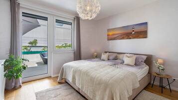 2 slaapkamers, een strijkplank/strijkijzer, wifi, beddengoed