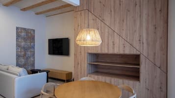 Apartamento superior | Área de estar | Smart TV 40 polegadas com canais digitais