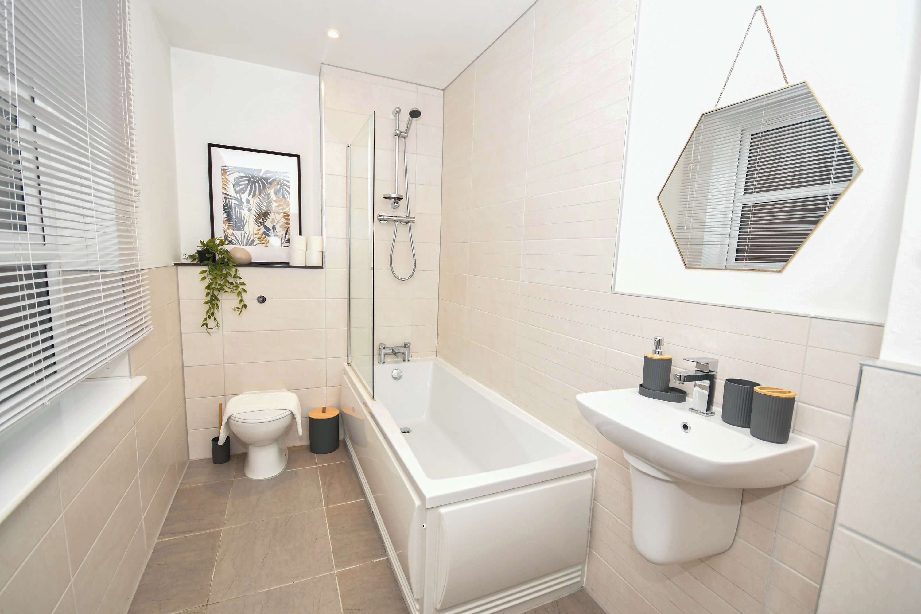 Shower, hair dryer, towels, shampoo