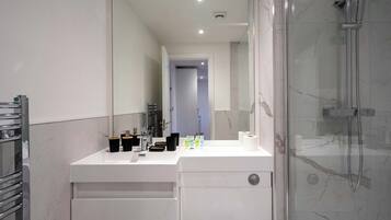 Shower, free toiletries, hair dryer, towels