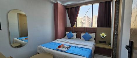Deluxe Double Room, City View | Laptop workspace, iron/ironing board, free WiFi
