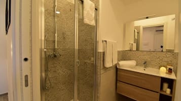 Double Room, Balcony, Garden View | Bathroom | Shower, rainfall showerhead, free toiletries, hair dryer
