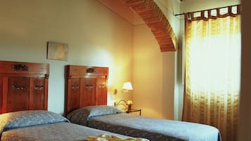 Appartement Familial, vue jardin | Coffres-forts dans les chambres, rideaux occultants