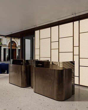 A modern reception area with a large, patterned wall and a sleek, dark reception desk. - Hotel Leev Miromesnil (Paris)