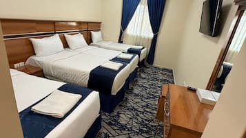 Deluxe fyrbäddsrum | Minibar, gratis wi-fi och sängkläder