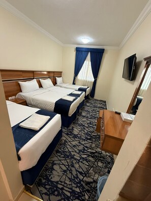 Deluxe fyrbäddsrum | Minibar, gratis wi-fi och sängkläder