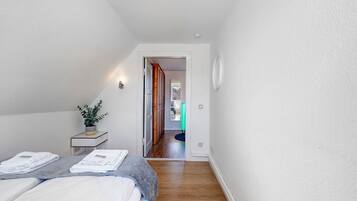 2 dormitorios, tabla de planchar con plancha, wifi y ropa de cama