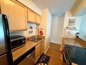 Microwave, oven, stovetop, dishwasher - Cozy 2 bedroom condo with Mountain View  in perfect Fraser location (Fraser)