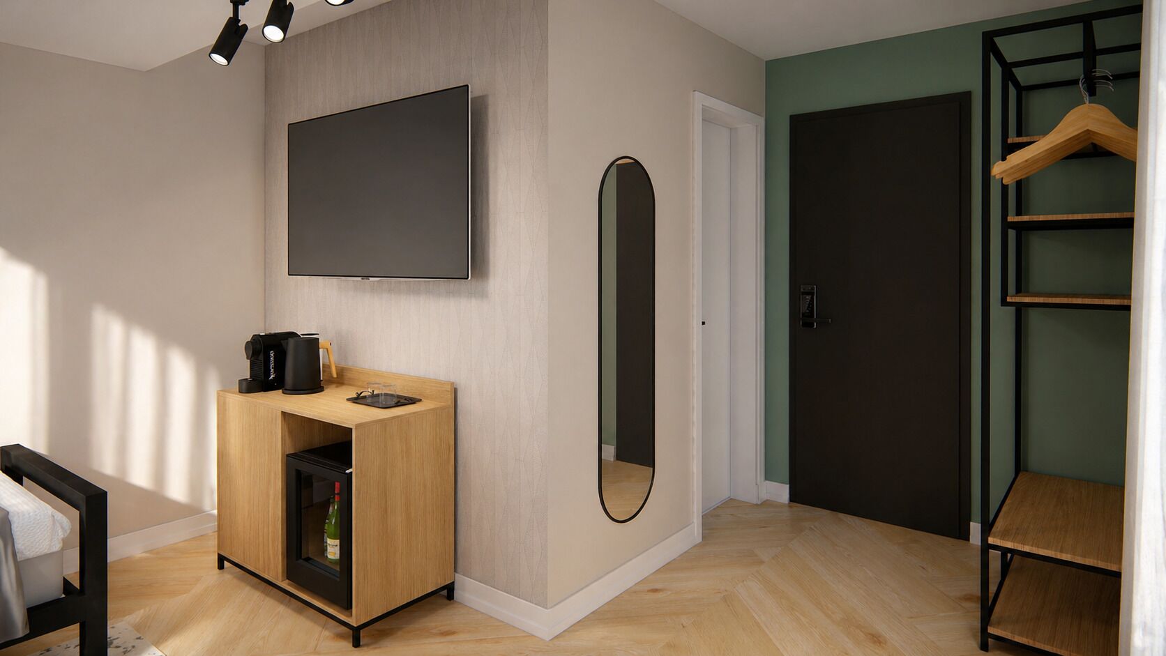 A modern room with a flat-screen TV mounted on the wall, a wooden cabinet with a coffee maker, a mirror, and a clothing rack.