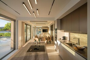 Deluxe Villa, Private Pool, Sea View | Private kitchen | Full-sized fridge, microwave, oven, stovetop - Edem Beachfront Luxury Villa (Agios Nikolaos)