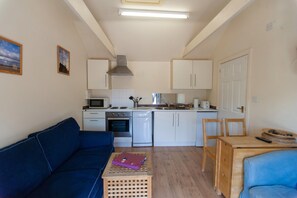 Cottage | Privékeuken | Een kinderstoel