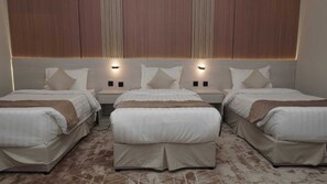 Deluxe suite, uitzicht op de stad | Een strijkplank/strijkijzer, gratis wifi