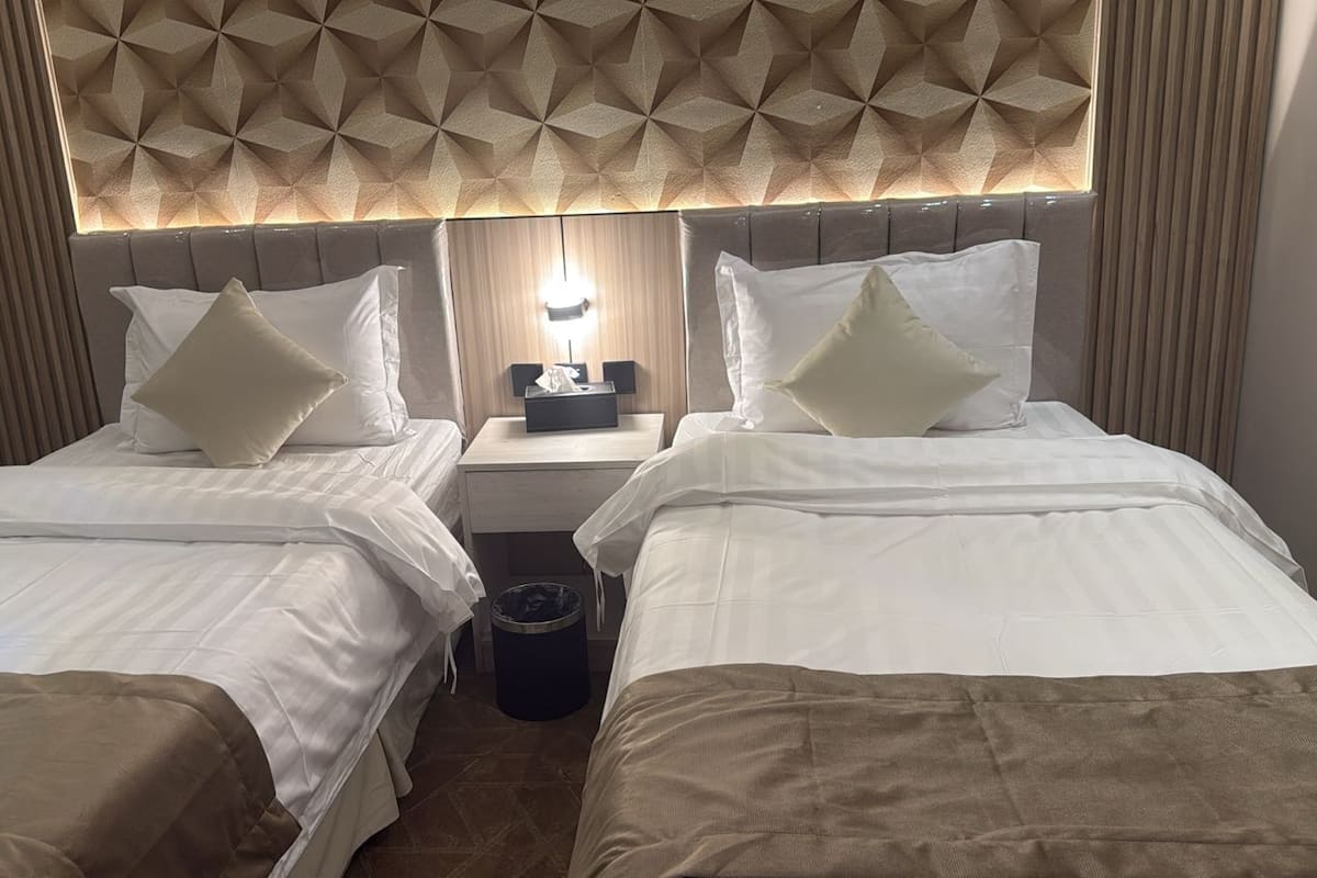 Deluxe Suite, 2 Bedrooms, City View | Iron/ironing board, free WiFi