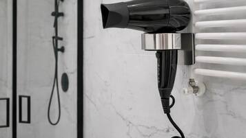 Comfort Double Room | Bathroom amenities | Shower, hair dryer, slippers, towels