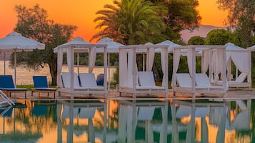 Indoor pool, seasonal outdoor pool, pool umbrellas, sun loungers